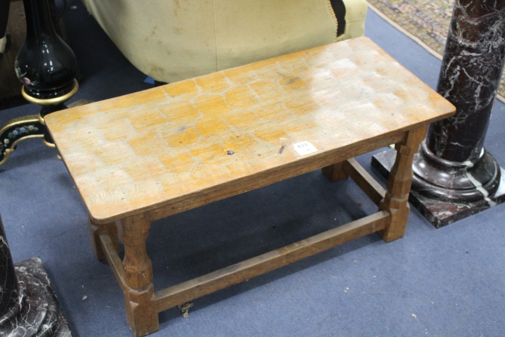 A Robert Thompson Mouseman carved oak low table, with mouse to one leg, W.83cm D.37cm H.39.5cm